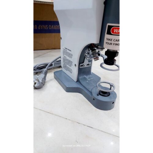 Alternative view of Máy đóng khoen, nút (điện 220V) Máy dập cúc điện tử Có cảm biến chống dập tay Model XINDING 818 Gồm máy, chân, mặt bàn
